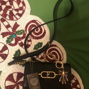 Just in New  with tag Vince  Camuto Fenel leather black and gold crossbody bag